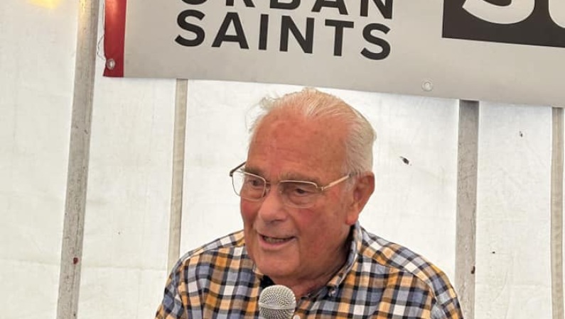 John Hicks, who first camped as a Crusader at Studland in 1945, sharing memories at its 90th anniversary this summer.